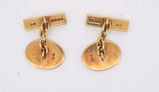 A pair of Elizabeth II 18ct gold oval cufflinks, engraved with lion's head crest, S.J. Rose & Son, Birmingham, 1973, 22 grams. Condition - fair
